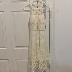 Guess size 4 cream dress. Worn once for graduation. Excellent condition.